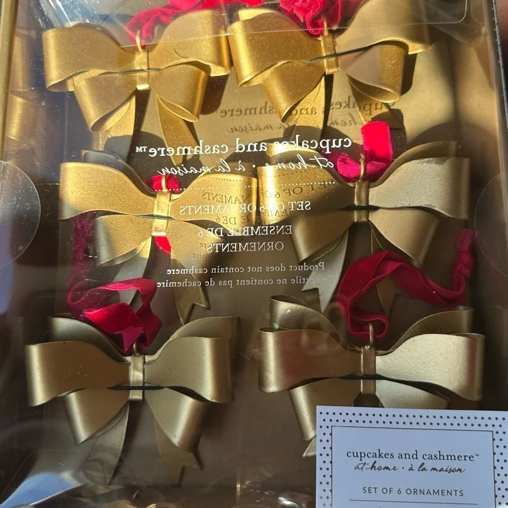 Cupcake and Cashmere gold medal bow ornaments with red velvet ribbon